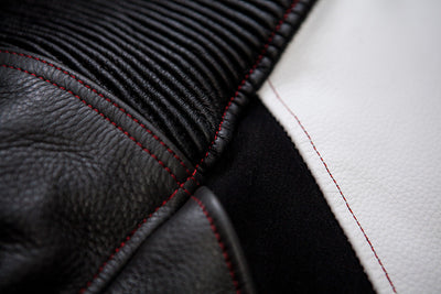 Polyester/cotton threads for skating leather suits